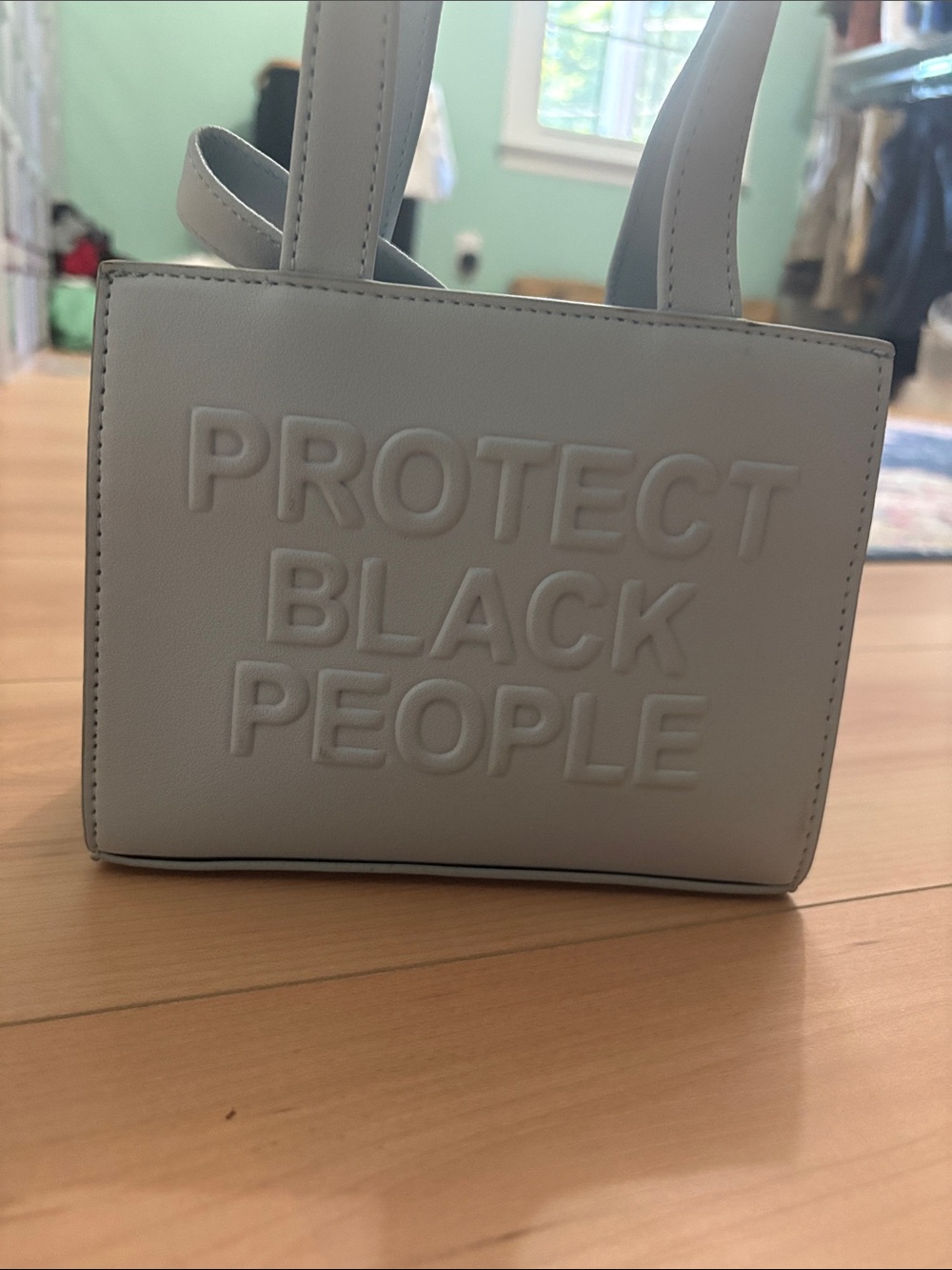 Baby blue Embossed Mini Tote - PROTECT BLACK PEOPLE